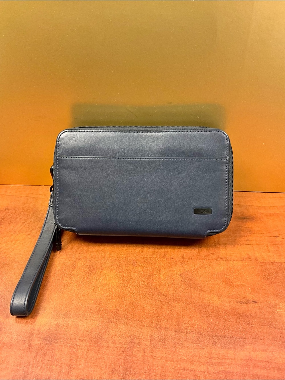 Tumi Navy Leather Toiletry Wrist Pouch